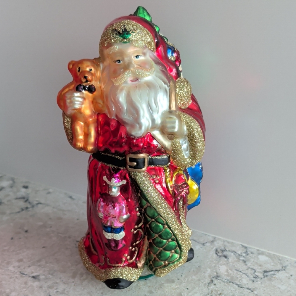 Festive Santa Claus Ornament with Gold Accents